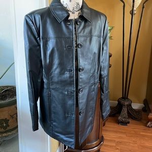 Woman’s. Jacket. 100% leather.  lining 100% polyester